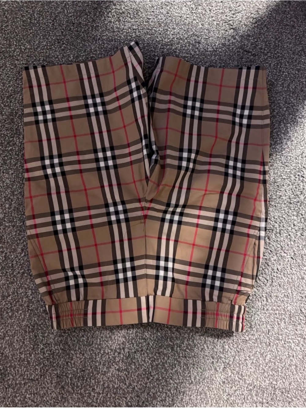 Burberry Beige Plaid Shorts with Black and Red Accents